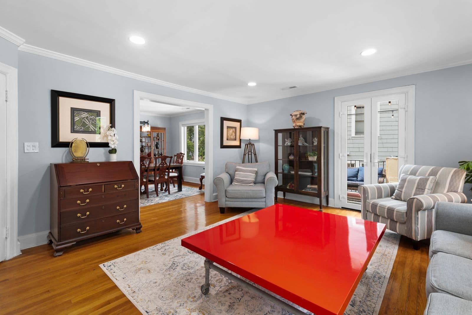 Living room with windows and French doors